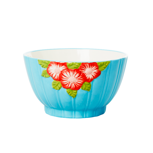Bowl de cerámica turquesa con flores rojas