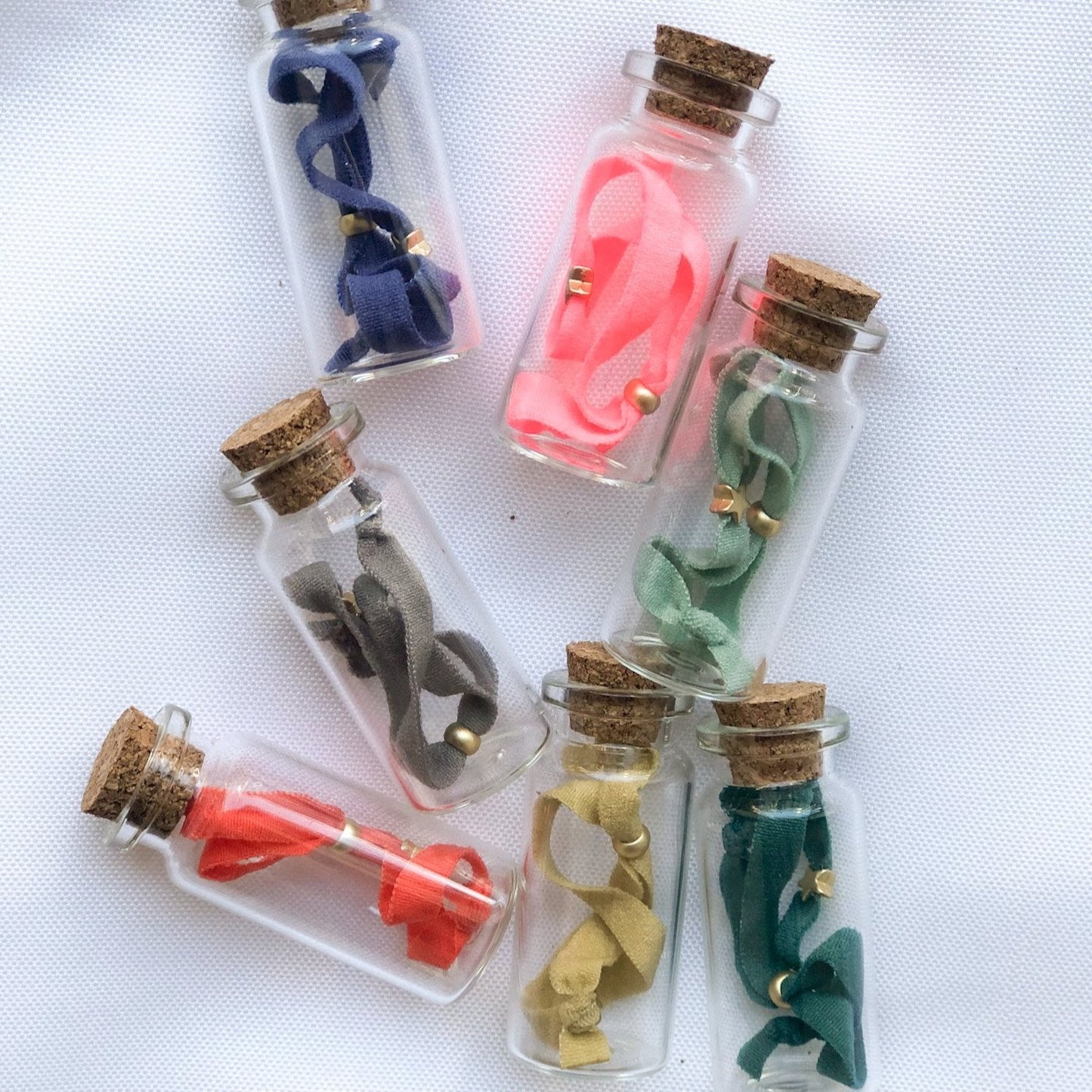 Pulsera estrella en bote de cristal