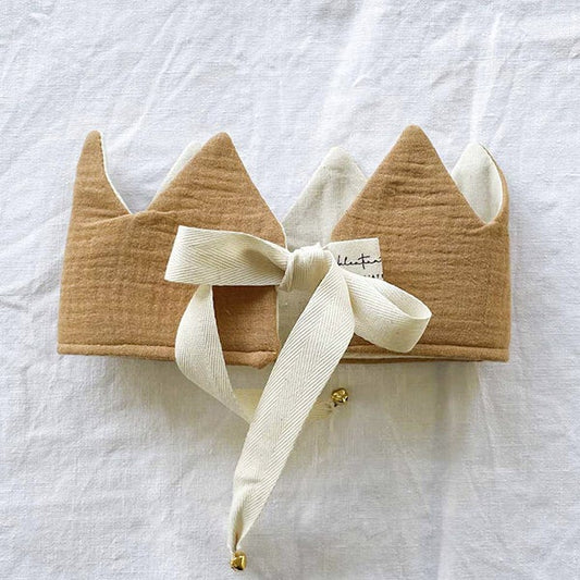 Corona de tela Mostaza con cinta y cascabel