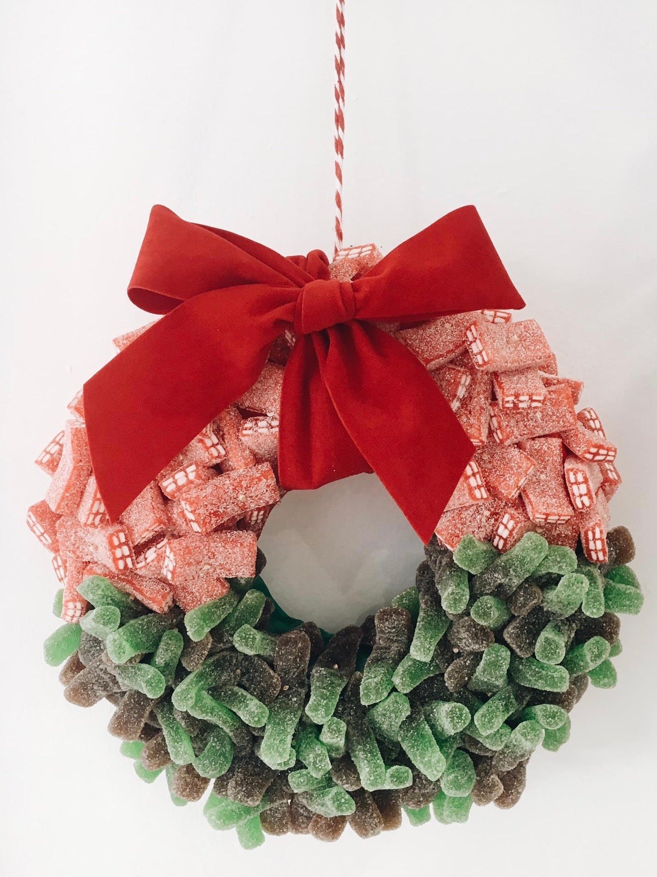 Corona de navidad golosina y lazada